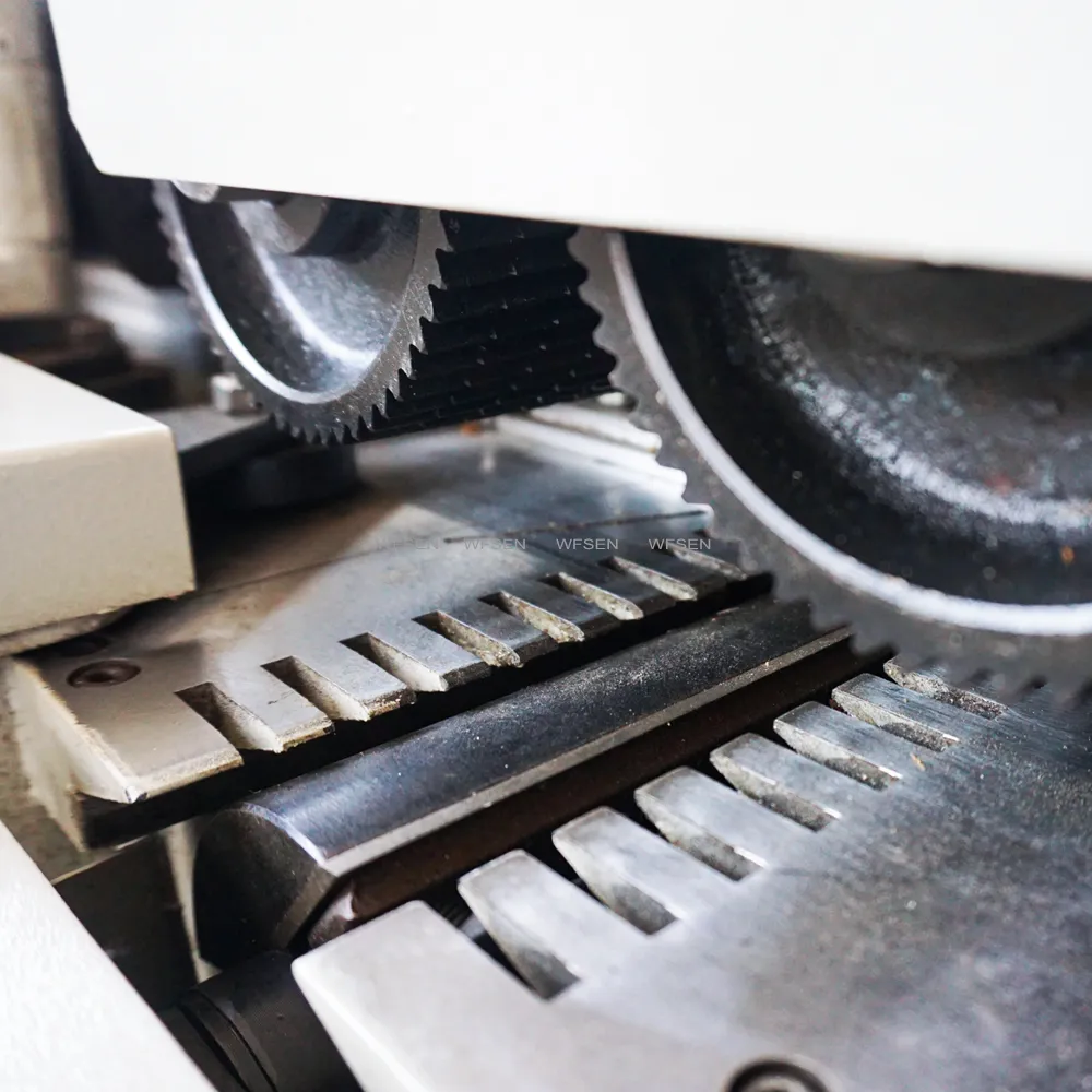 Cutter head and segmented feed rollers inside a four side moulder