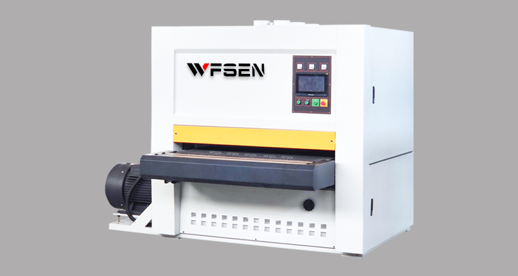 Wide belt sanding machine with three heads for calibrating and finishing wood panels